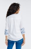 Blouse boutonnée uni avec broderie