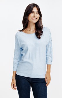 Pull détails festonnés et strass placés
