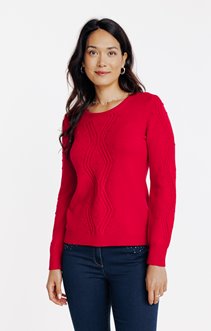 Pull avec jeu de torsades et pois