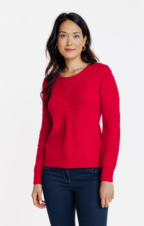 Pull avec jeu de torsades et pois