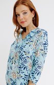 Blouse col v avec froufrou lien bijoux