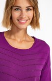 Pull col rond motif strass placé
