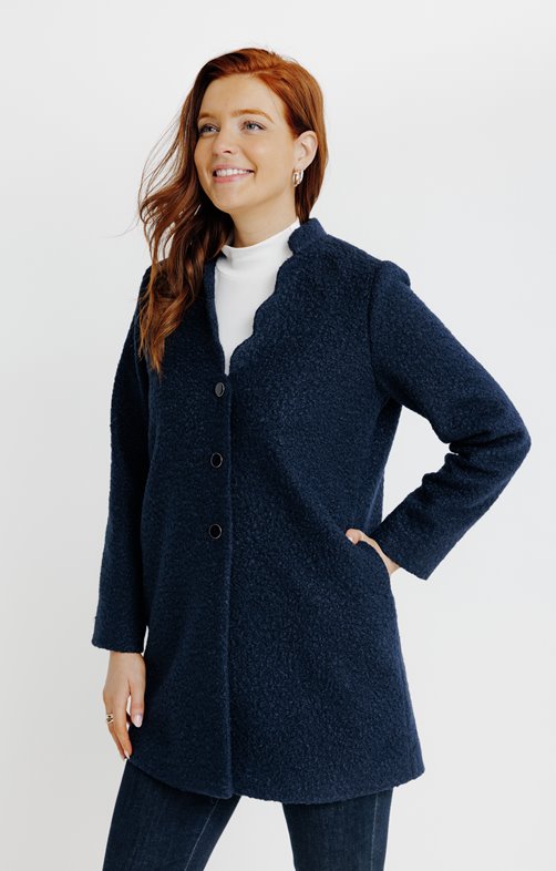 Manteau long en matière bouclette