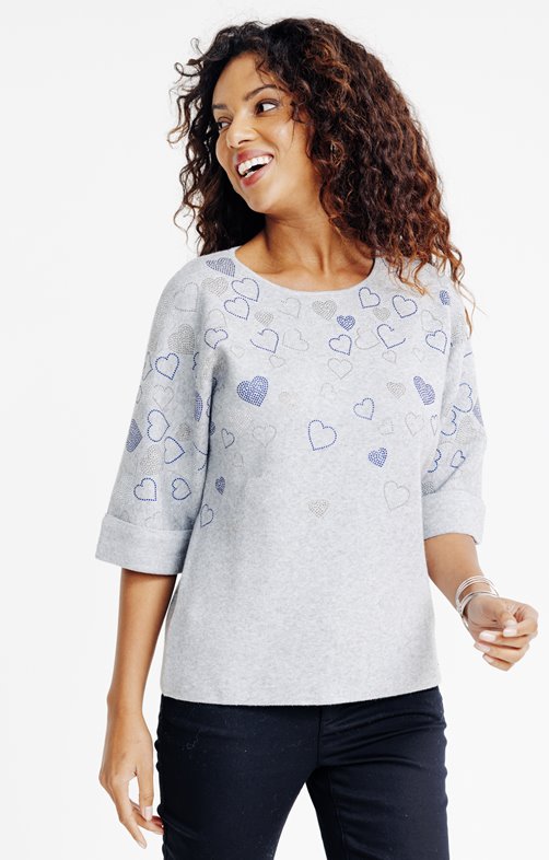 Pull avec coeurs en strass sur le devant