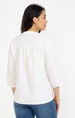 Blouse brodée avec détail de froufrou