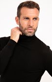 Pull uni col roulé 