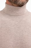 Pull uni col roulé 