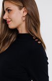 Pull avec détails contrastés