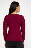Pull avec strass au col
