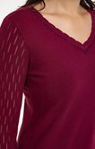 Pull avec strass au col
