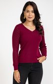 Pull avec strass au col