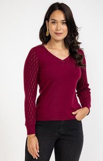 Pull avec strass au col
