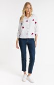 Chemise unie et broderie fleurs