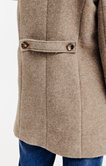 Manteau boutonné detail martingale