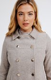 Manteau double patte de boutonnage
